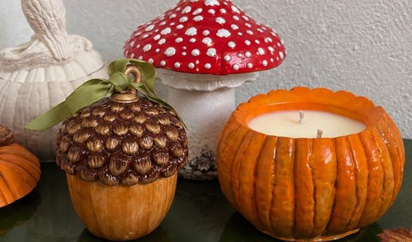 Hand-painted plaster candle holders: an acorn, a toadstool and a pumpkin with a candle